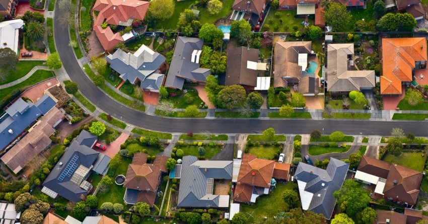 An aerial shot of all the beautiful houses in a neighborhood located in Dallas, Tx